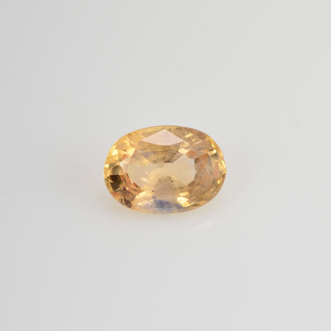0.94 cts Natural Yellow Sapphire Loose Gemstone Oval Cut - Thai Gems Export Ltd.