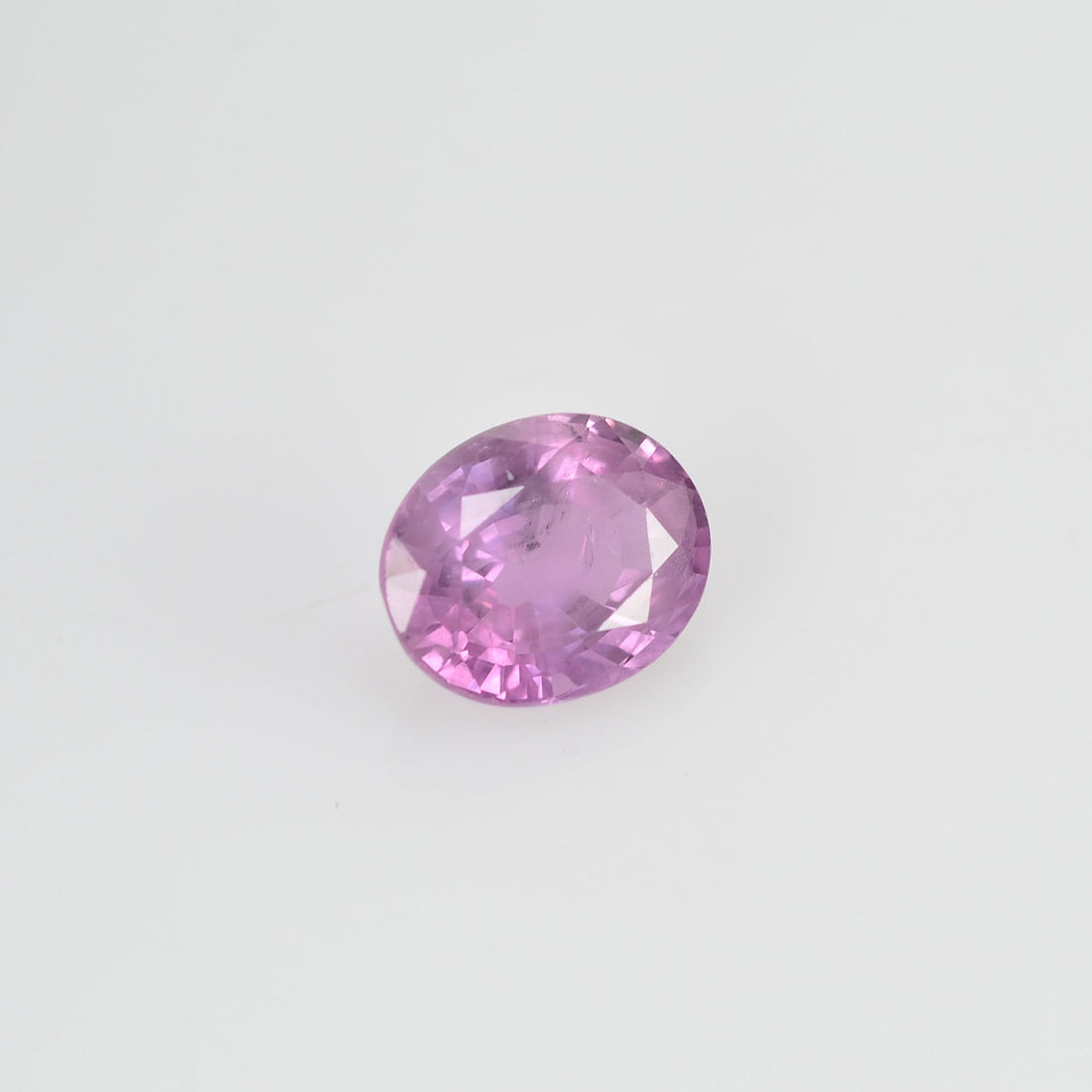 0.76 cts Natural Fancy Pink Sapphire Loose Gemstone oval Cut - Thai Gems Export Ltd.