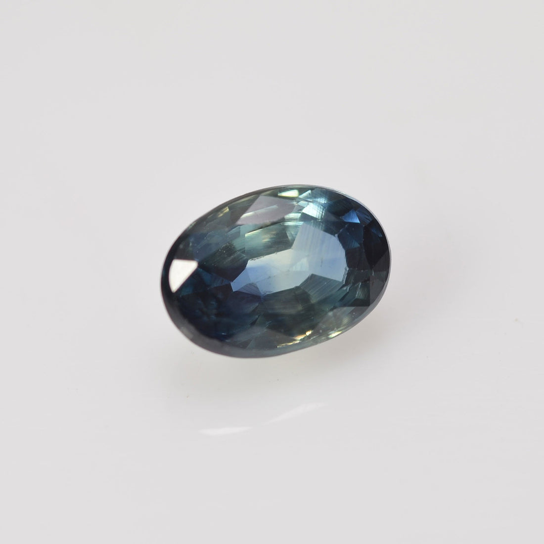 0.75 cts Natural Blue Green Teal Sapphire Loose Gemstone Oval Cut - Thai Gems Export Ltd.