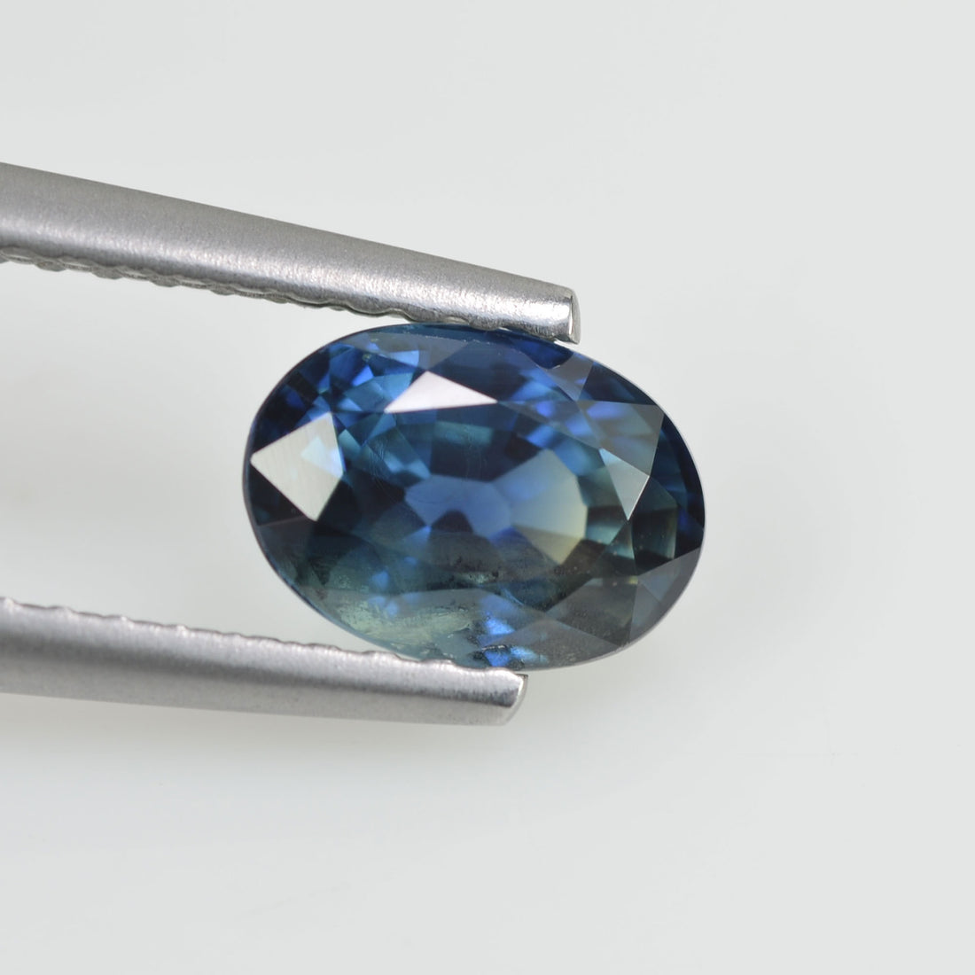 1.39  cts Natural Blue Green Teal Sapphire Loose Gemstone Oval Cut - Thai Gems Export Ltd.
