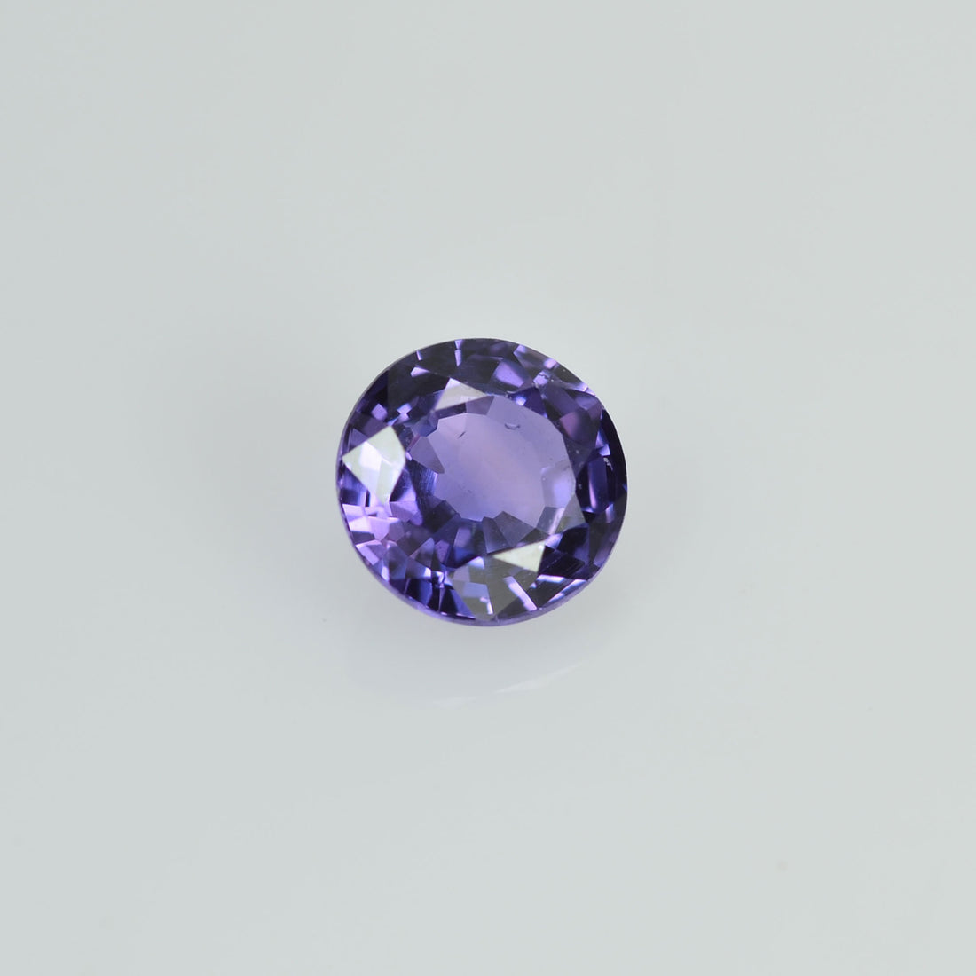 0.38 cts Natural Purple Sapphire Loose Gemstone Round Cut - Thai Gems Export Ltd.