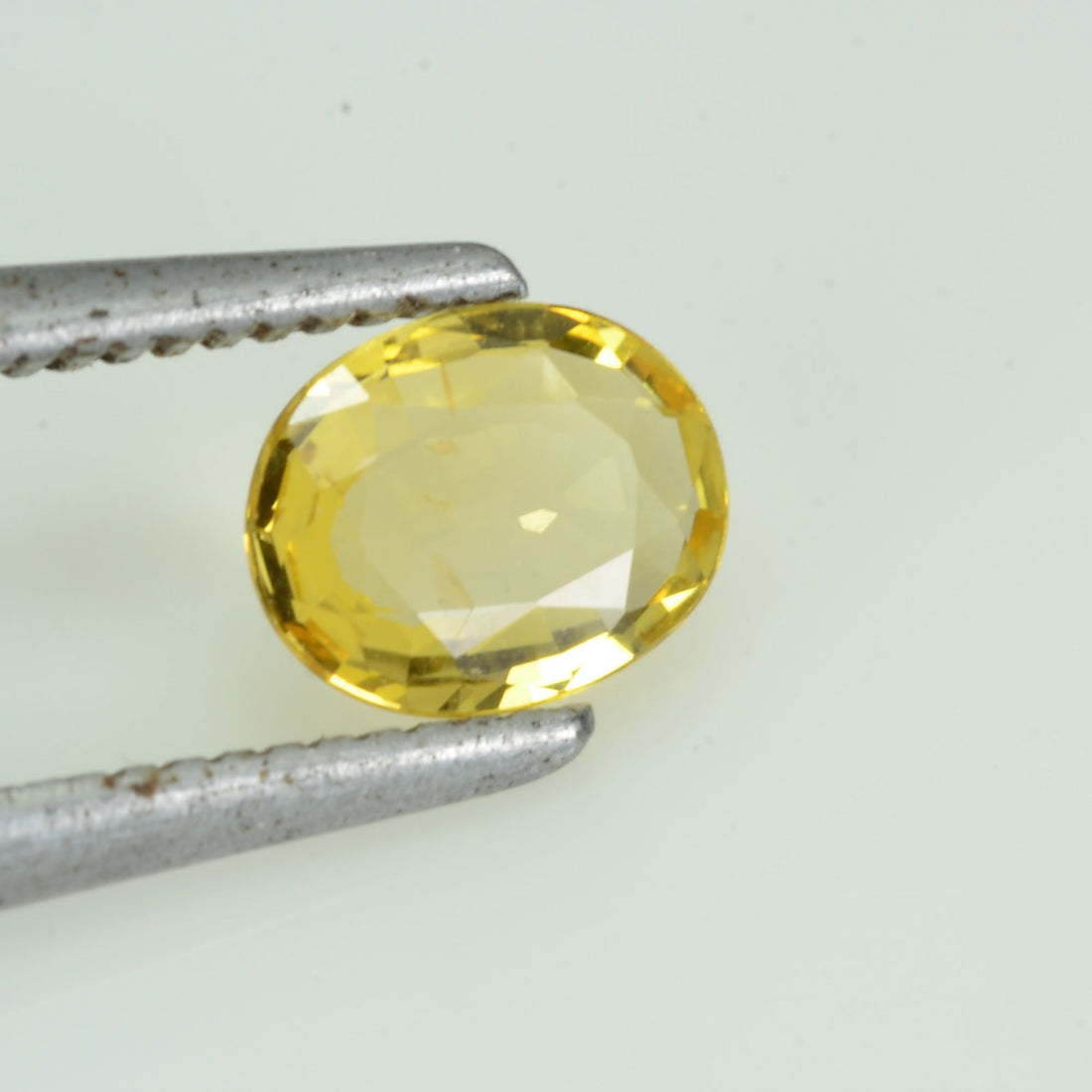 0.58 cts Natural Yellow Sapphire Loose Gemstone Oval Cut