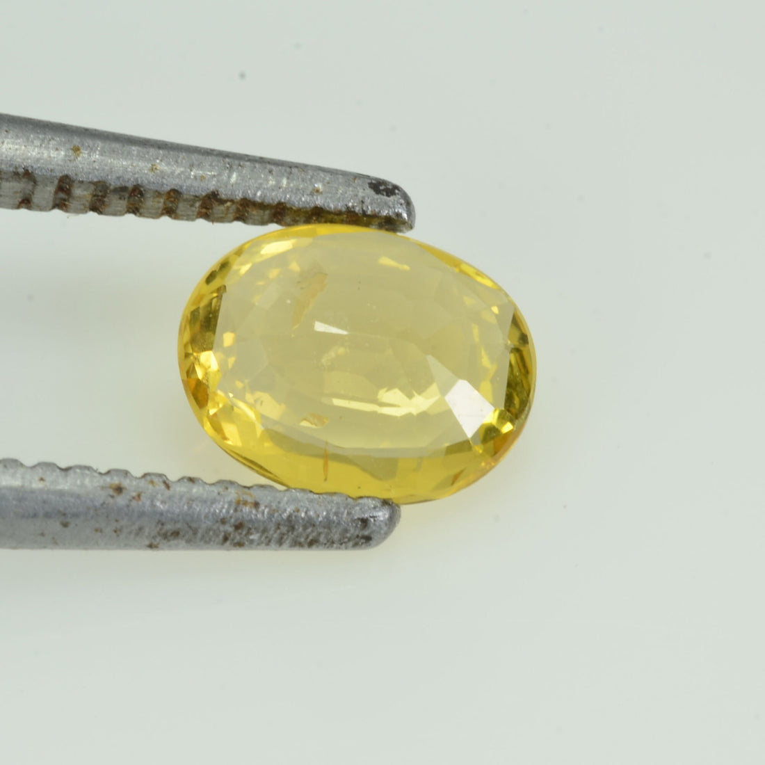 0.58 cts Natural Yellow Sapphire Loose Gemstone Oval Cut