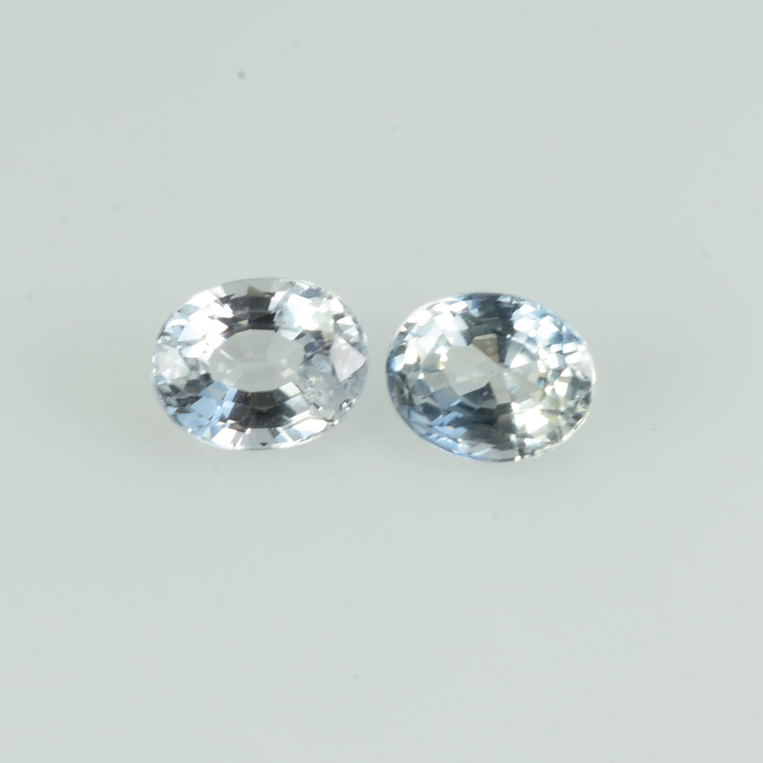 0.72 cts Natural White Sapphire Loose Pair Gemstone Oval Cut - Thai Gems Export Ltd.