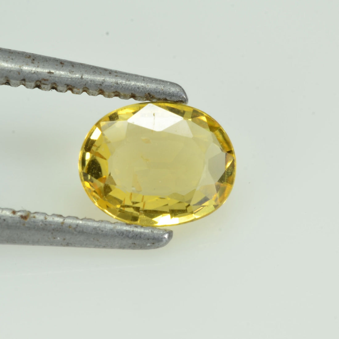 0.58 cts Natural Yellow Sapphire Loose Gemstone Oval Cut
