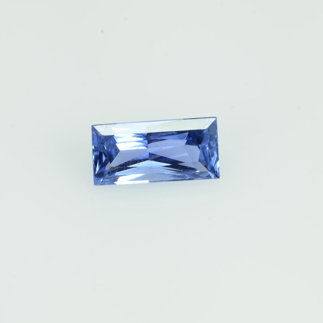 0.53 cts Natural Blue Sapphire Loose Gemstone Baguette Cut - Thai Gems Export Ltd.