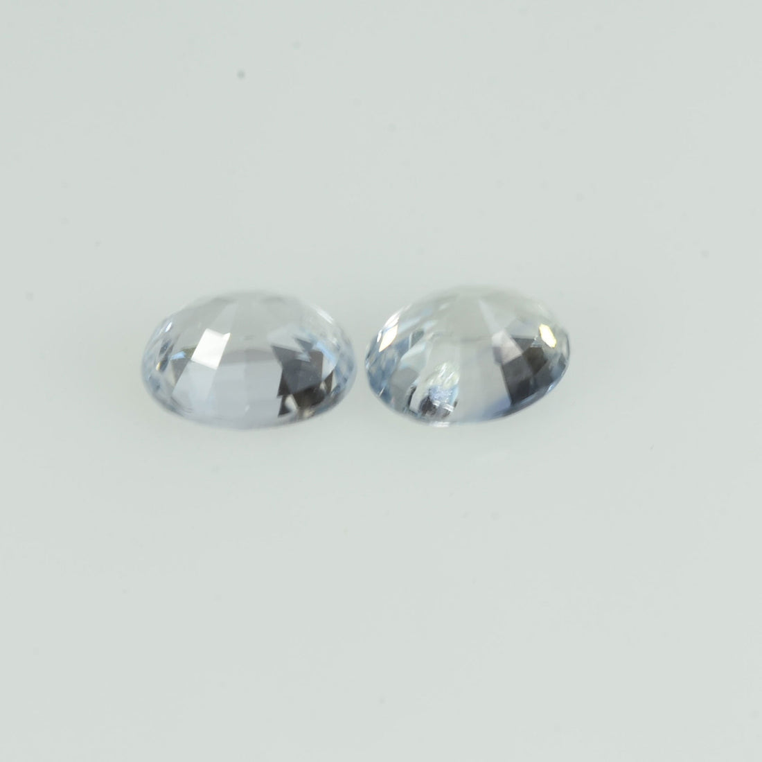 0.72 cts Natural White Sapphire Loose Pair Gemstone Oval Cut - Thai Gems Export Ltd.