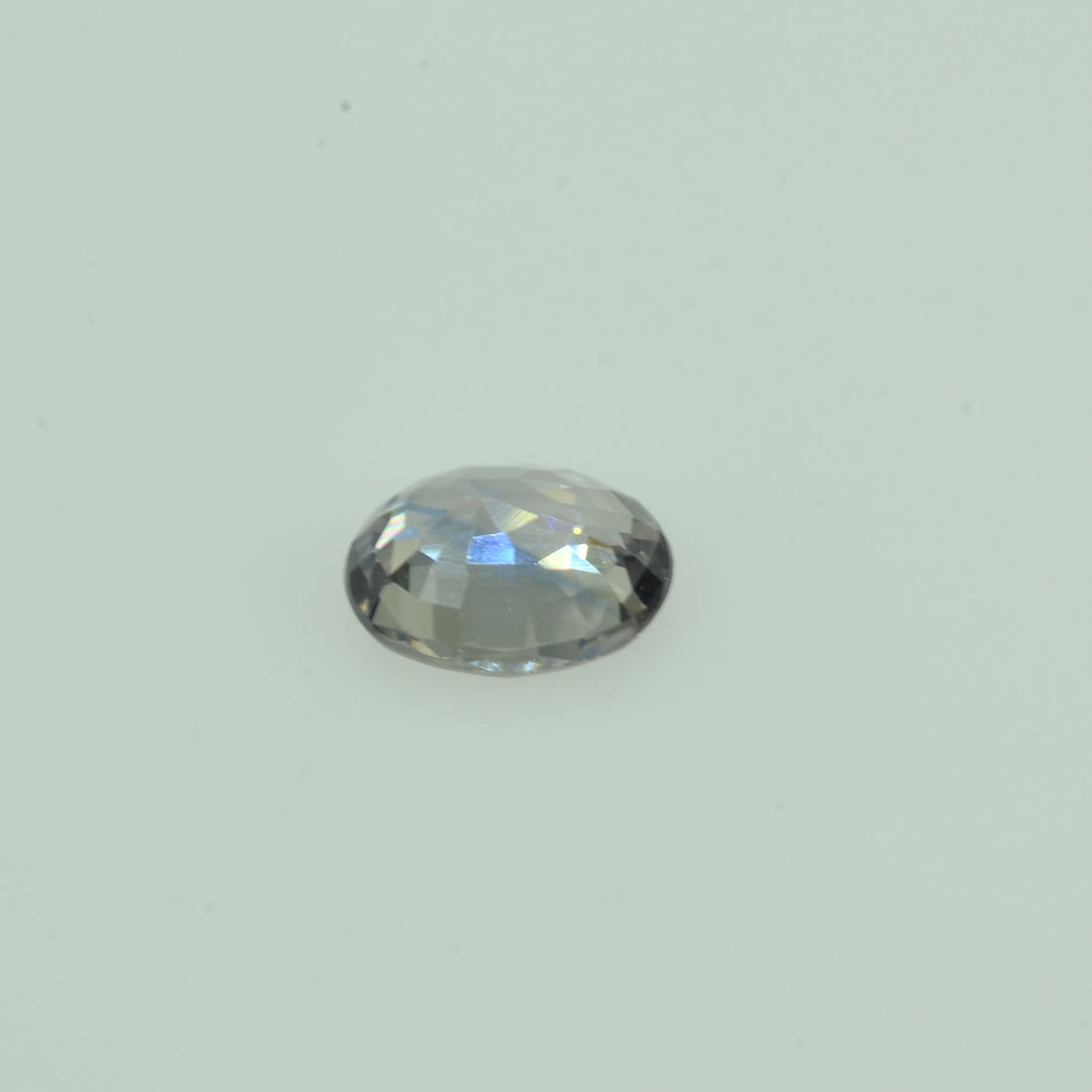 0.54 cts Natural PurpleAsh Sapphire Loose Gemstone Oval Cut - Thai Gems Export Ltd.