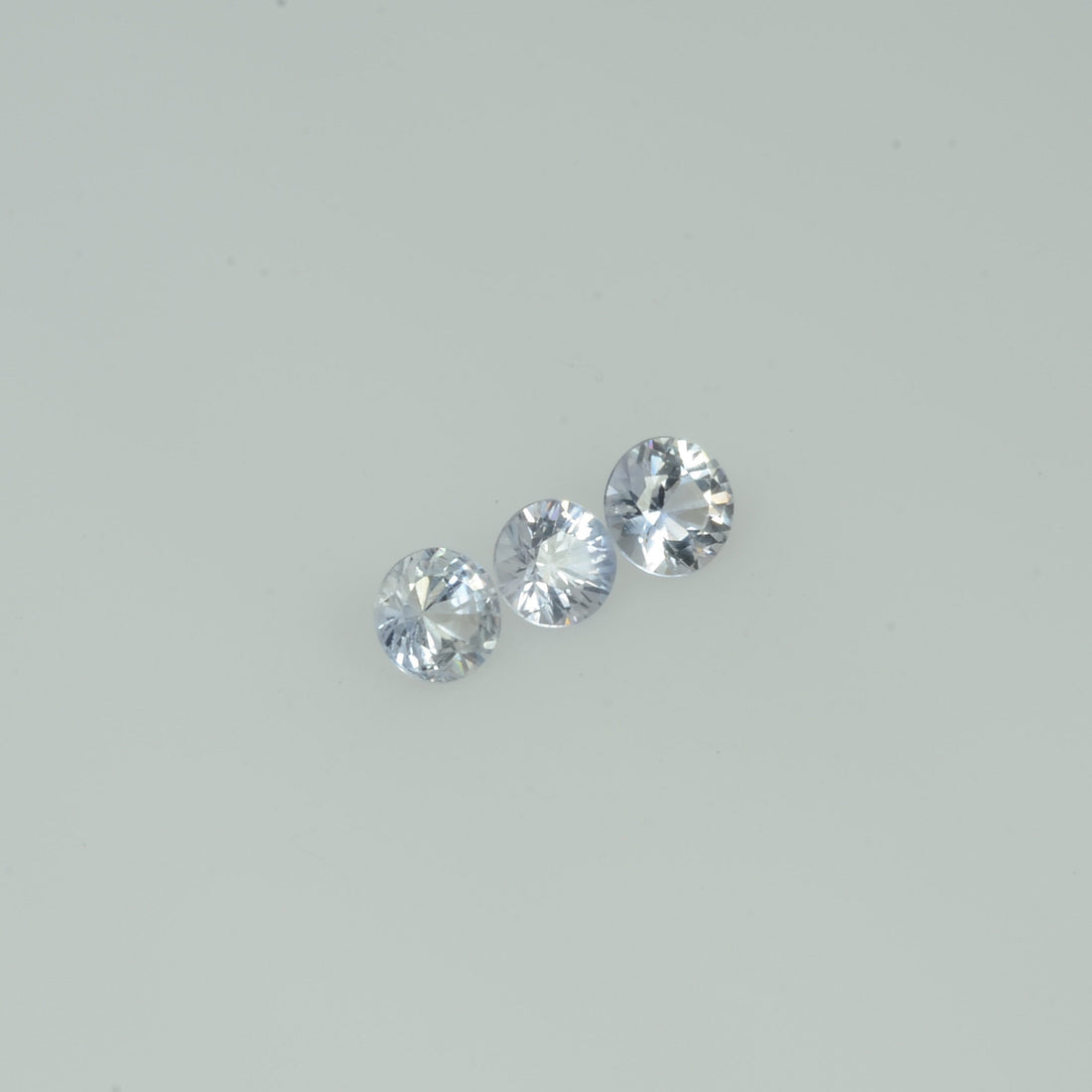 2.0-4.0 mm Natural Whitish Blue Sapphire Loose Vs Quality  Gemstone Round Diamond Cut - Thai Gems Export Ltd.
