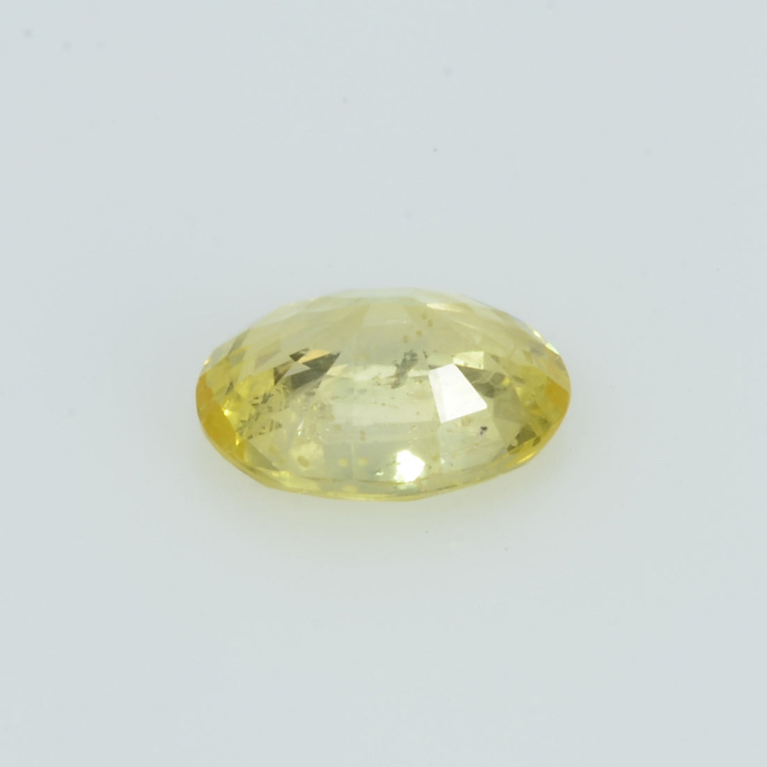 0.95 Cts Natural Yellow Sapphire Loose Gemstone Oval Cut - Thai Gems Export Ltd.
