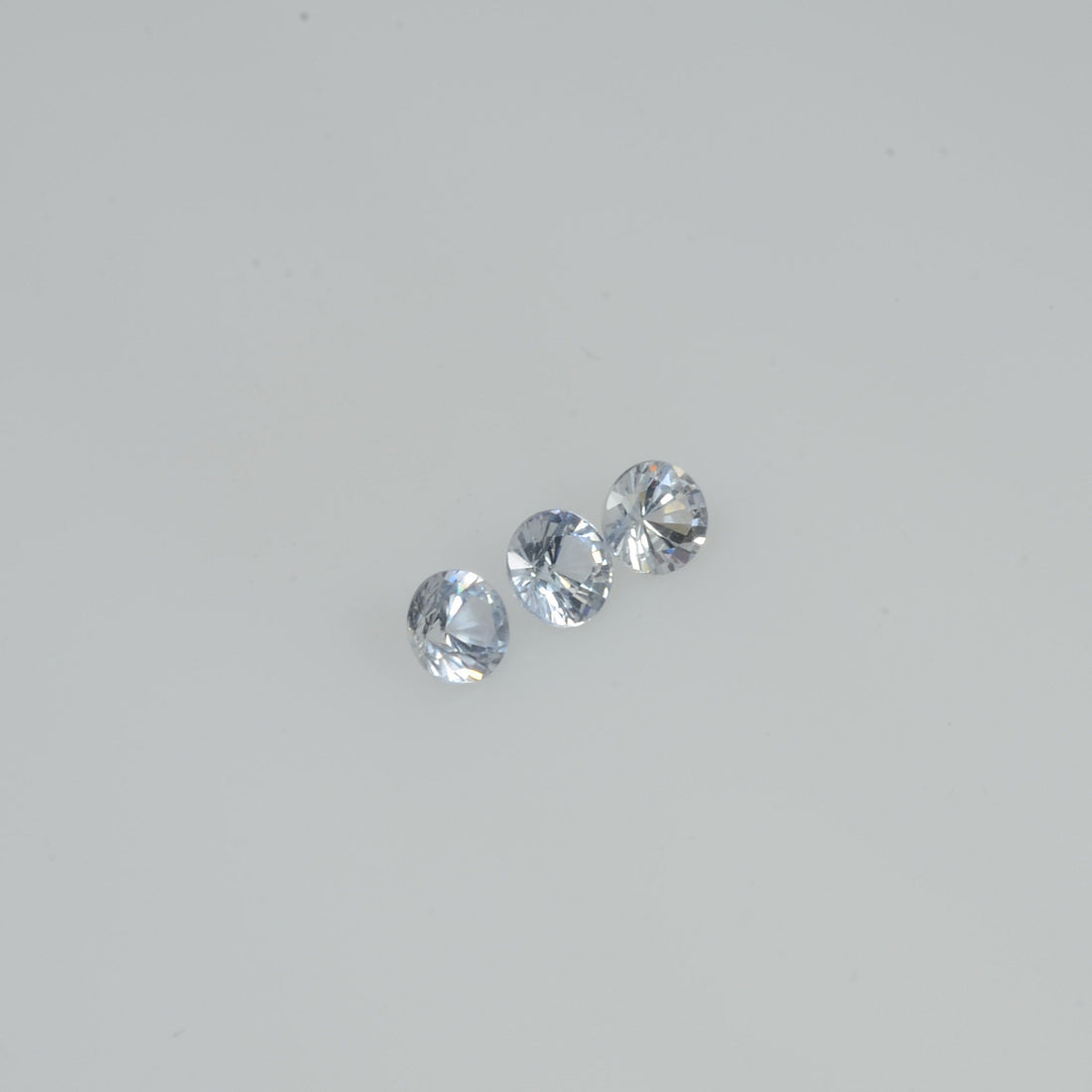 2.5-4.0   mm Natural Whitish Blue Sapphire Loose Cleanish Quality  Gemstone Round Diamond Cut - Thai Gems Export Ltd.
