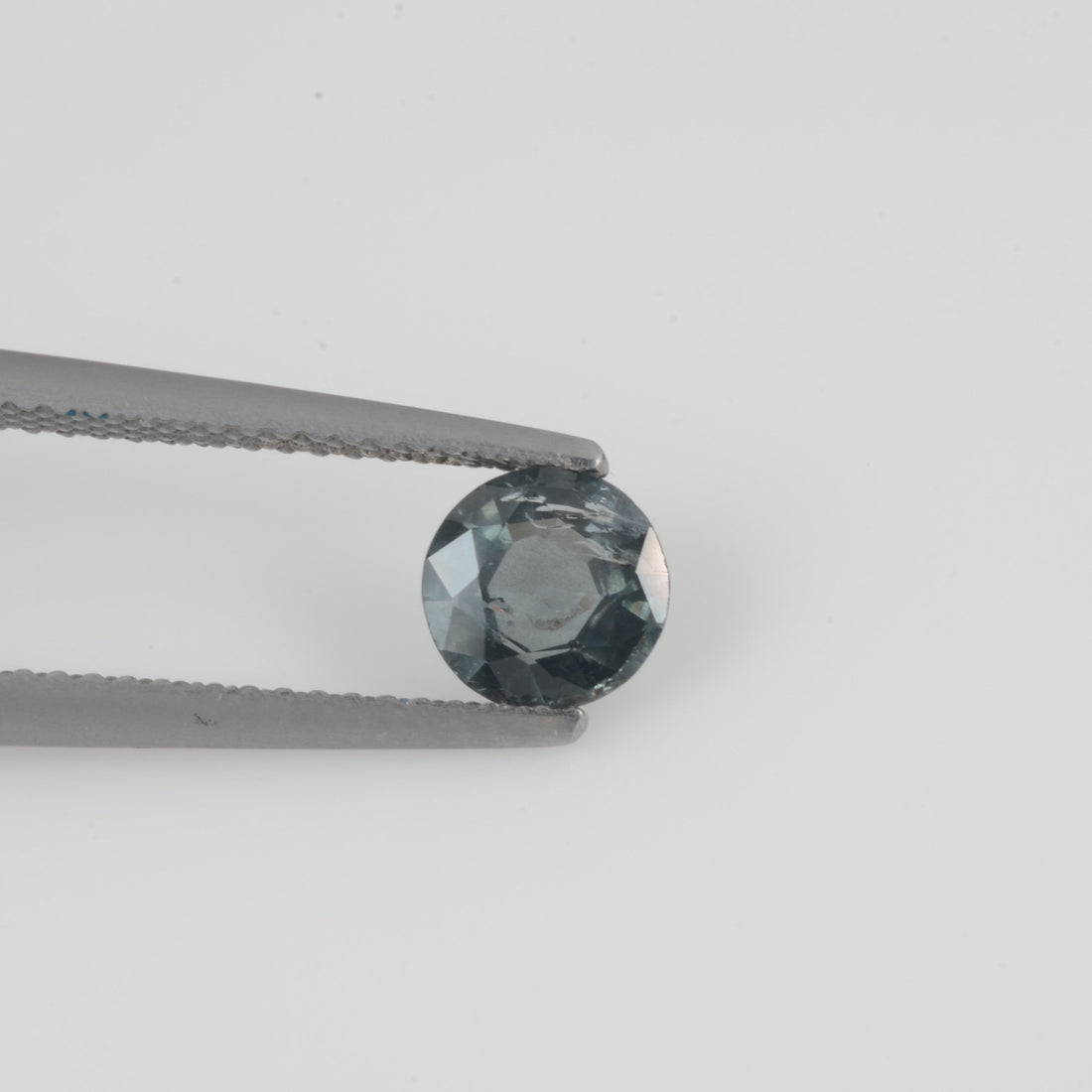 6.1 mm Natural Bluish Green Sapphire Loose Gemstone Round Cut - Thai Gems Export Ltd.