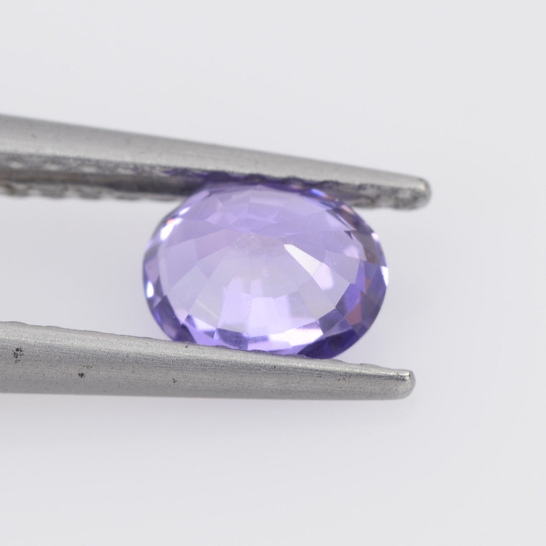 0.61 cts Natural Purple Sapphire Loose Gemstone Oval Cut