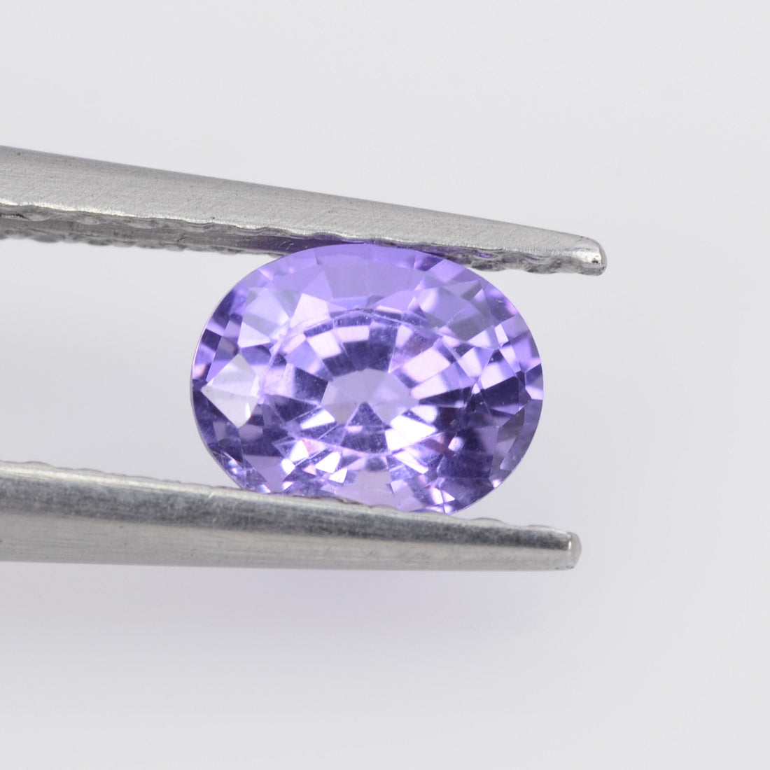 0.61 cts Natural Purple Sapphire Loose Gemstone Oval Cut